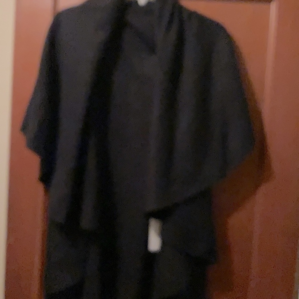 Sweater can be worn several ways…personally I like the shawl version